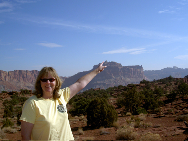 Susan Darger hiking to Navajo Knobs in Capitol Reef National Park